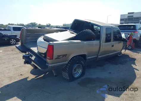 1998 Chevrolet K1500 Fleetside z USA, uszkodzony, nr VIN 1GCEK19R0WE127348